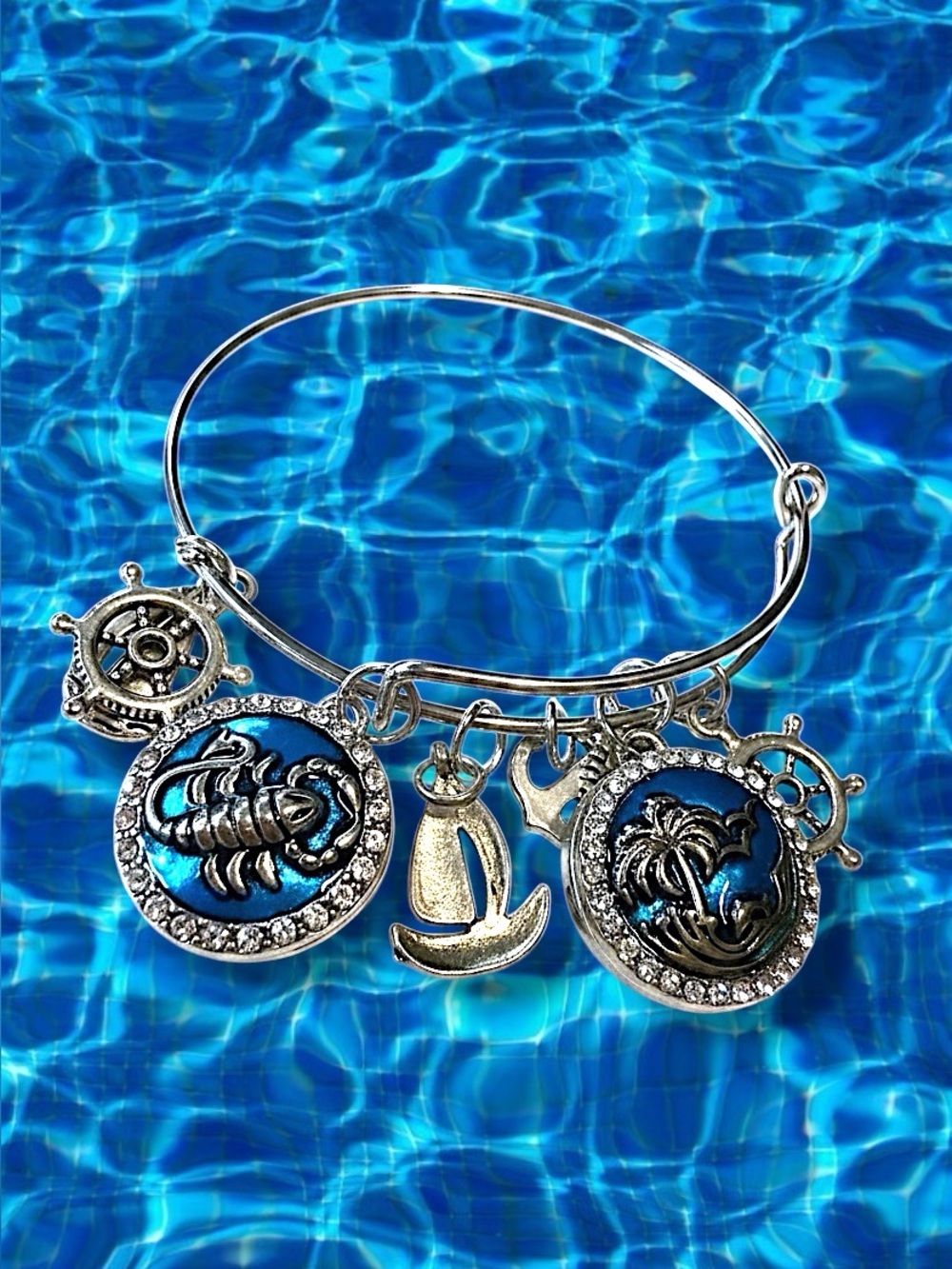 Silver Nautical Charm Bangle Bracelet with Blue Shell Accents